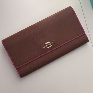 Coach light brown & bright pink envelope wallet